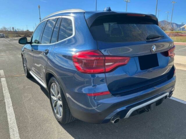 Синий БМВ Х3, объемом двигателя 2 л и пробегом 38 тыс. км за 7200 $, фото 5 на Automoto.ua