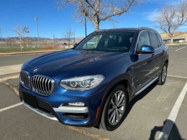 Синий БМВ Х3, объемом двигателя 2 л и пробегом 38 тыс. км за 7200 $, фото 2 на Automoto.ua