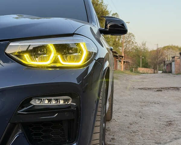 Синий БМВ Х3, объемом двигателя 3 л и пробегом 82 тыс. км за 42000 $, фото 3 на Automoto.ua