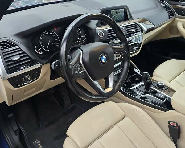 Синий БМВ Х3, объемом двигателя 2 л и пробегом 65 тыс. км за 25600 $, фото 3 на Automoto.ua