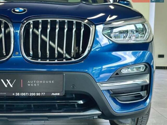 Синий БМВ Х3, объемом двигателя 2 л и пробегом 98 тыс. км за 37990 $, фото 3 на Automoto.ua
