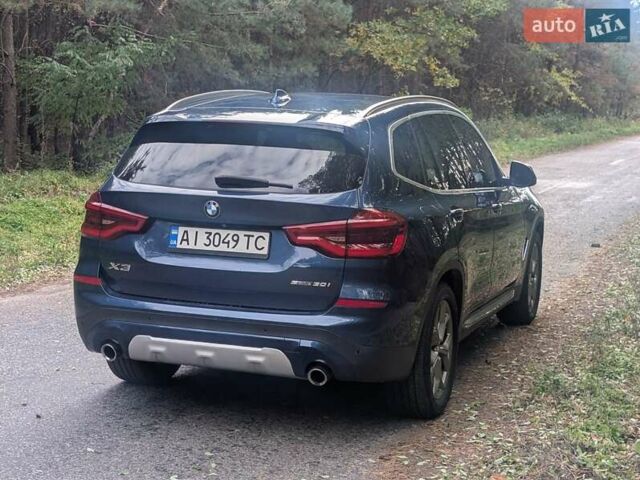 Синий БМВ Х3, объемом двигателя 2 л и пробегом 76 тыс. км за 29700 $, фото 38 на Automoto.ua