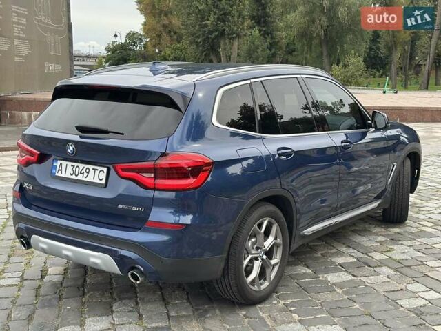 Синій БМВ Х3, об'ємом двигуна 2 л та пробігом 74 тис. км за 29900 $, фото 29 на Automoto.ua