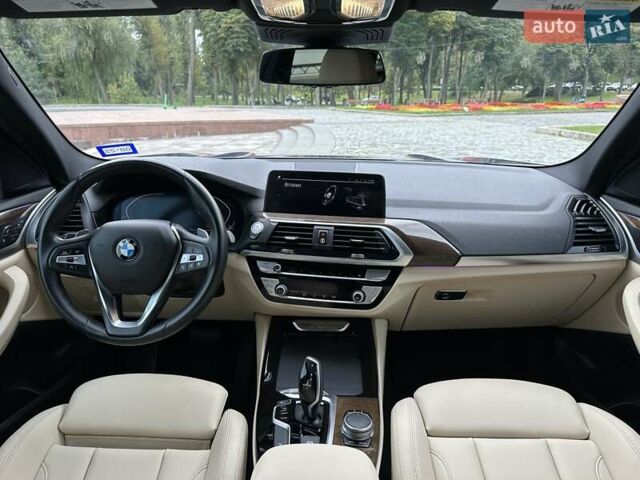Синій БМВ Х3, об'ємом двигуна 2 л та пробігом 74 тис. км за 29900 $, фото 2 на Automoto.ua