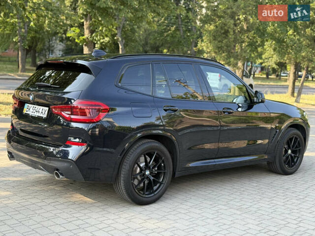 Синий БМВ Х3, объемом двигателя 2 л и пробегом 71 тыс. км за 38500 $, фото 5 на Automoto.ua