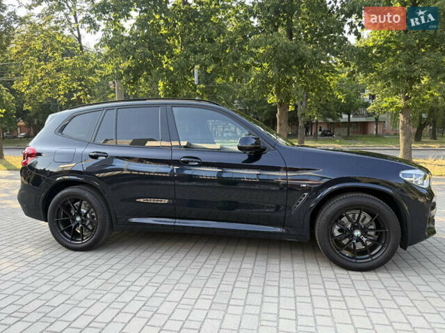 Синий БМВ Х3, объемом двигателя 2 л и пробегом 71 тыс. км за 38500 $, фото 4 на Automoto.ua