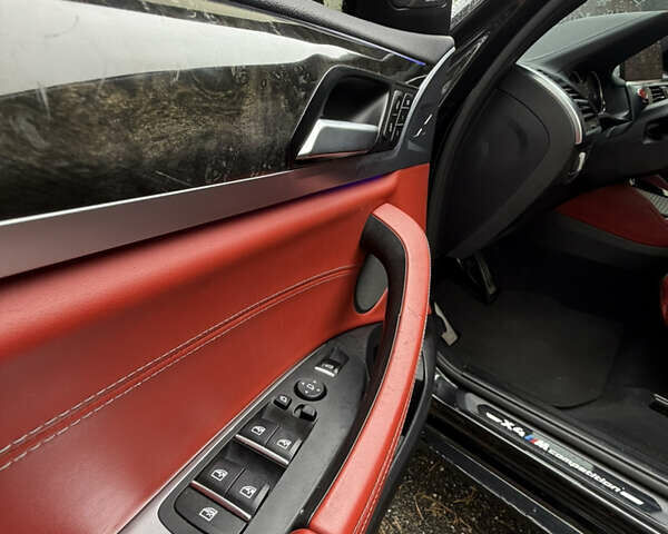 Черный БМВ X4 M, объемом двигателя 2.99 л и пробегом 85 тыс. км за 54500 $, фото 19 на Automoto.ua