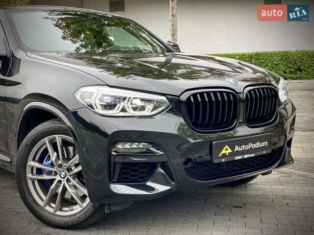 Черный БМВ X4 M, объемом двигателя 2.99 л и пробегом 33 тыс. км за 52800 $, фото 2 на Automoto.ua