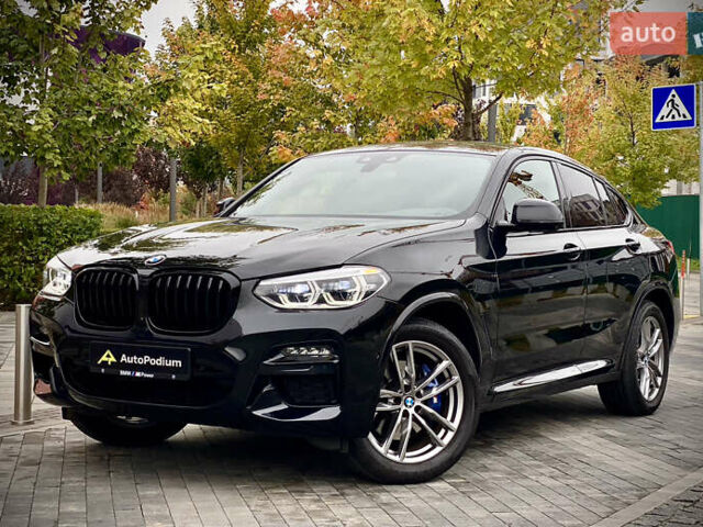 Черный БМВ X4 M, объемом двигателя 2.99 л и пробегом 33 тыс. км за 52800 $, фото 1 на Automoto.ua