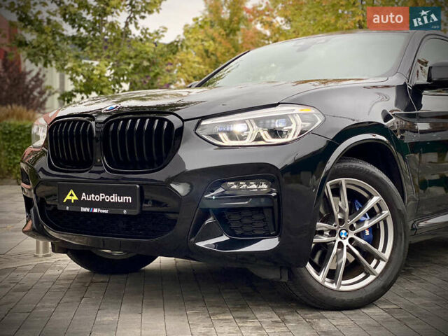 Черный БМВ X4 M, объемом двигателя 2.99 л и пробегом 33 тыс. км за 52800 $, фото 3 на Automoto.ua