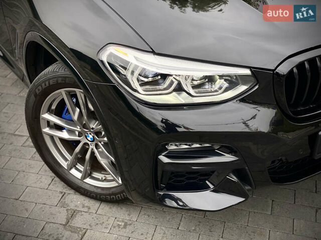 Черный БМВ X4 M, объемом двигателя 2.99 л и пробегом 33 тыс. км за 52800 $, фото 4 на Automoto.ua
