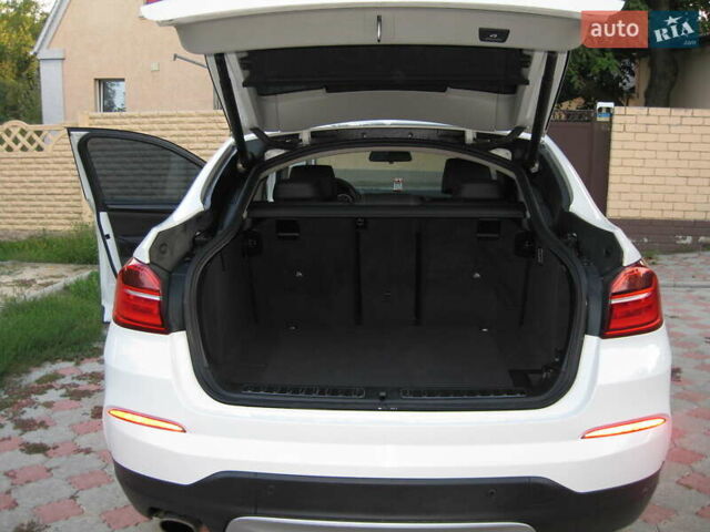 Белый БМВ Х4, объемом двигателя 2 л и пробегом 108 тыс. км за 30000 $, фото 7 на Automoto.ua