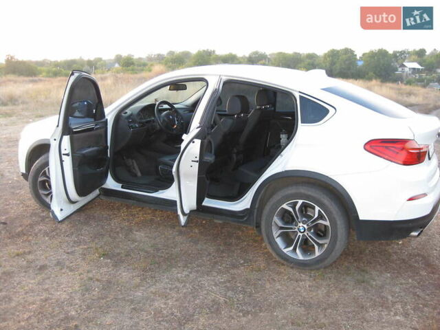 Белый БМВ Х4, объемом двигателя 2 л и пробегом 108 тыс. км за 30000 $, фото 6 на Automoto.ua