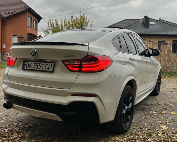 Белый БМВ Х4, объемом двигателя 2 л и пробегом 273 тыс. км за 22000 $, фото 6 на Automoto.ua