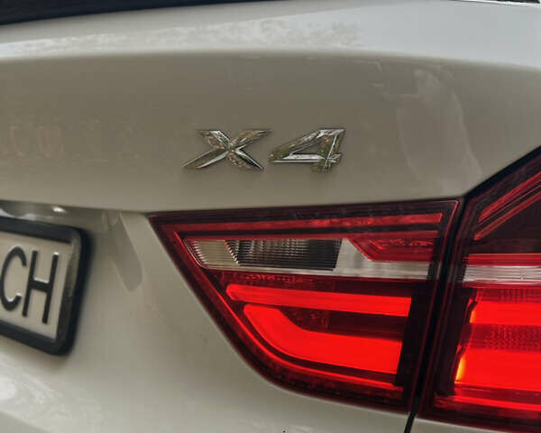 Белый БМВ Х4, объемом двигателя 2 л и пробегом 270 тыс. км за 22500 $, фото 4 на Automoto.ua