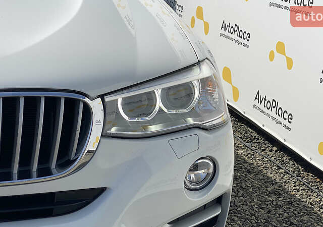 Білий БМВ Х4, об'ємом двигуна 2 л та пробігом 117 тис. км за 23800 $, фото 5 на Automoto.ua