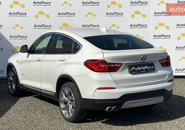Білий БМВ Х4, об'ємом двигуна 2 л та пробігом 117 тис. км за 23800 $, фото 27 на Automoto.ua