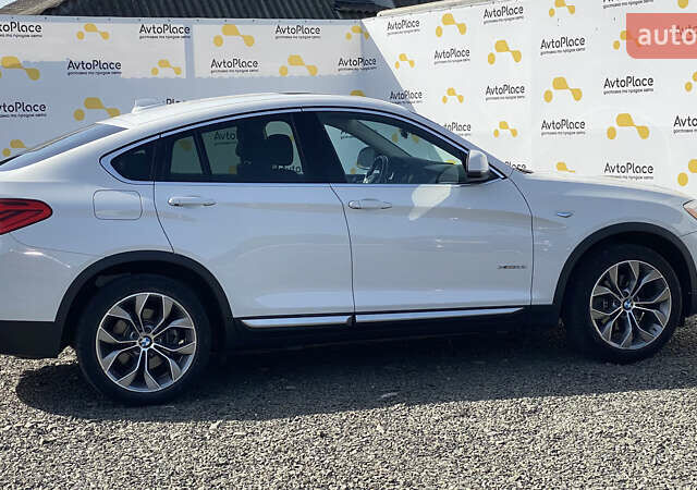 Білий БМВ Х4, об'ємом двигуна 2 л та пробігом 117 тис. км за 23800 $, фото 29 на Automoto.ua