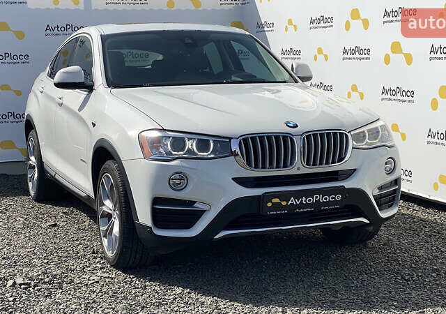 Білий БМВ Х4, об'ємом двигуна 2 л та пробігом 117 тис. км за 23800 $, фото 4 на Automoto.ua
