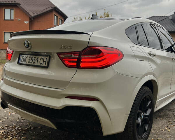 Белый БМВ Х4, объемом двигателя 2 л и пробегом 270 тыс. км за 22500 $, фото 3 на Automoto.ua