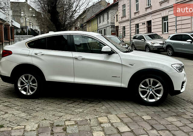 Белый БМВ Х4, объемом двигателя 2 л и пробегом 159 тыс. км за 19400 $, фото 1 на Automoto.ua