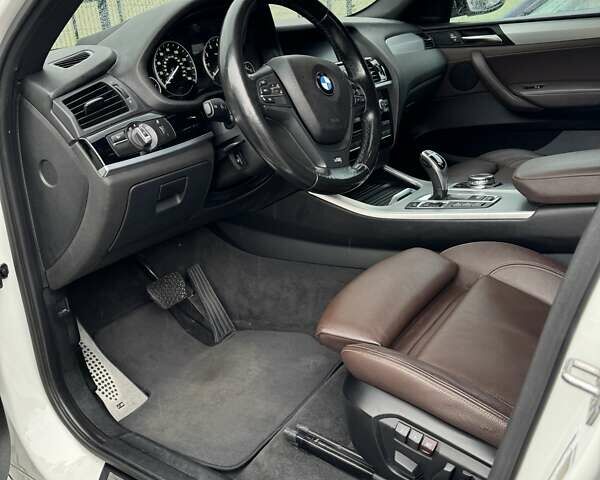 Белый БМВ Х4, объемом двигателя 2 л и пробегом 124 тыс. км за 20500 $, фото 3 на Automoto.ua