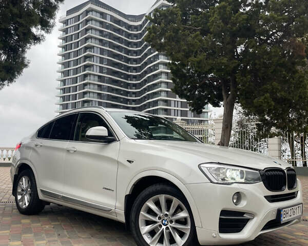 Белый БМВ Х4, объемом двигателя 2 л и пробегом 202 тыс. км за 25500 $, фото 2 на Automoto.ua
