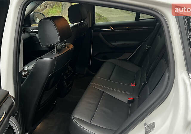 Белый БМВ Х4, объемом двигателя 2 л и пробегом 159 тыс. км за 19400 $, фото 13 на Automoto.ua