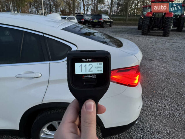 Белый БМВ Х4, объемом двигателя 2 л и пробегом 122 тыс. км за 22500 $, фото 24 на Automoto.ua