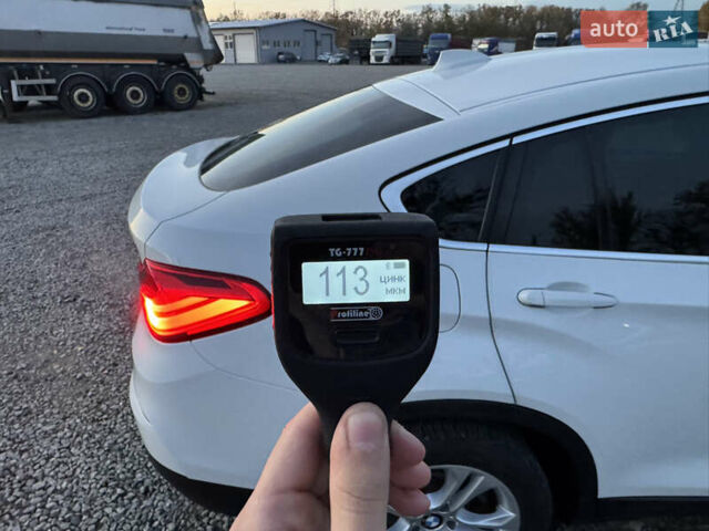 Белый БМВ Х4, объемом двигателя 2 л и пробегом 122 тыс. км за 22500 $, фото 26 на Automoto.ua