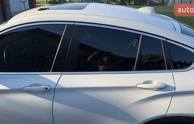 Білий БМВ Х4, об'ємом двигуна 2 л та пробігом 176 тис. км за 18500 $, фото 14 на Automoto.ua