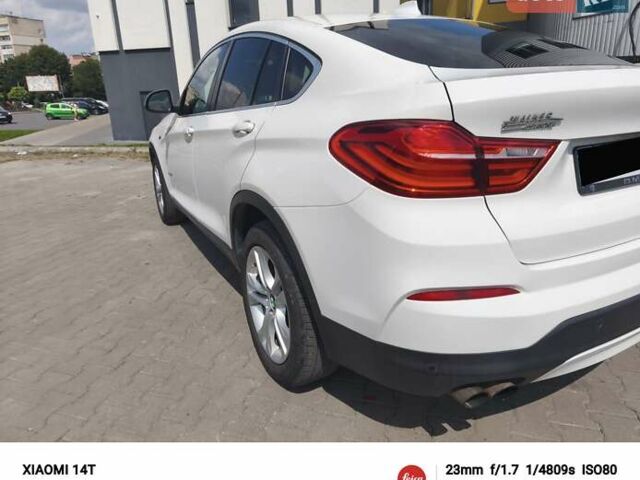 Белый БМВ Х4, объемом двигателя 2 л и пробегом 200 тыс. км за 17750 $, фото 3 на Automoto.ua