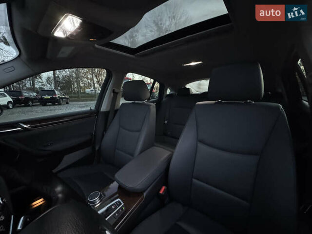 Белый БМВ Х4, объемом двигателя 2 л и пробегом 122 тыс. км за 22500 $, фото 7 на Automoto.ua