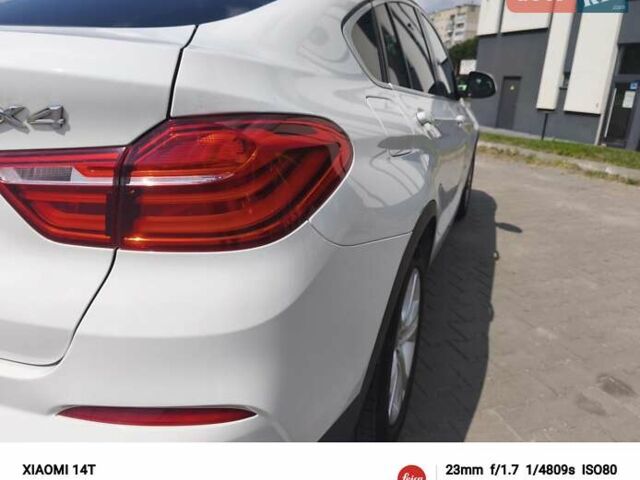 Белый БМВ Х4, объемом двигателя 2 л и пробегом 200 тыс. км за 17750 $, фото 4 на Automoto.ua