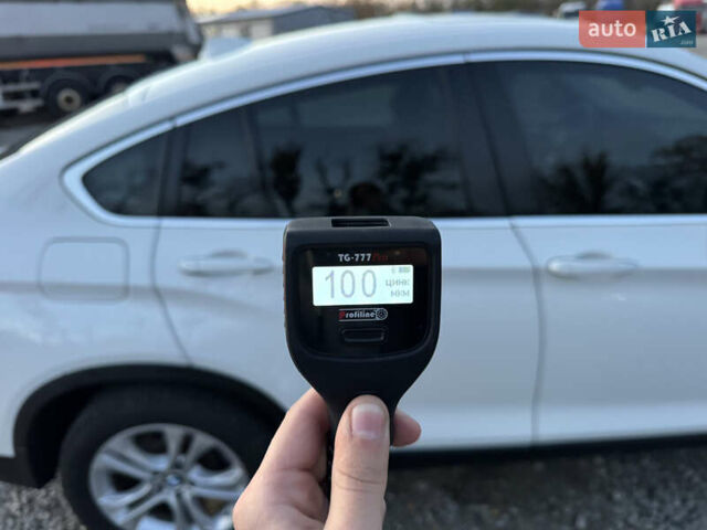 Белый БМВ Х4, объемом двигателя 2 л и пробегом 122 тыс. км за 22500 $, фото 27 на Automoto.ua
