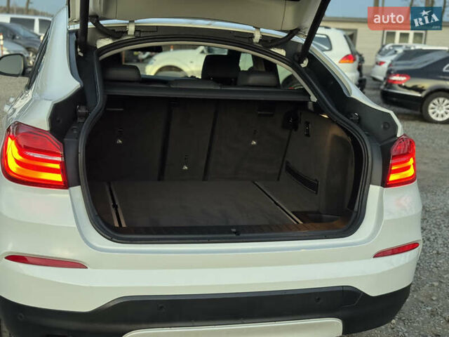 Белый БМВ Х4, объемом двигателя 2 л и пробегом 122 тыс. км за 22500 $, фото 18 на Automoto.ua