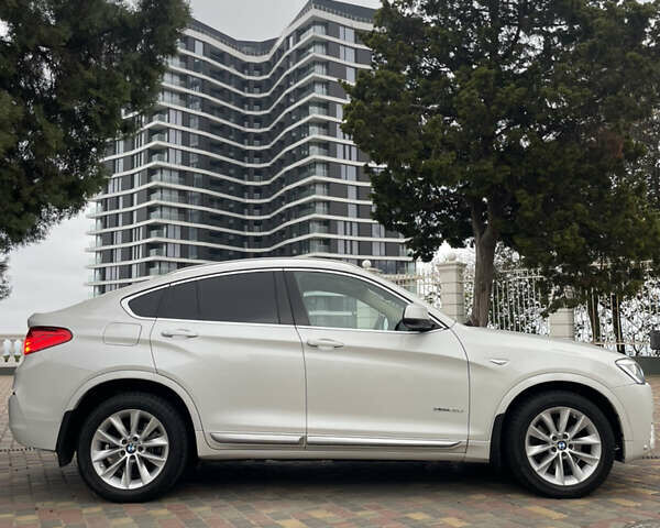 Белый БМВ Х4, объемом двигателя 2 л и пробегом 202 тыс. км за 25500 $, фото 5 на Automoto.ua