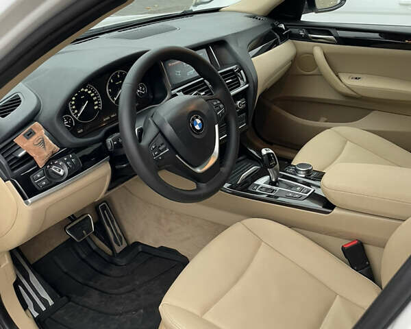 Белый БМВ Х4, объемом двигателя 2 л и пробегом 202 тыс. км за 25500 $, фото 18 на Automoto.ua