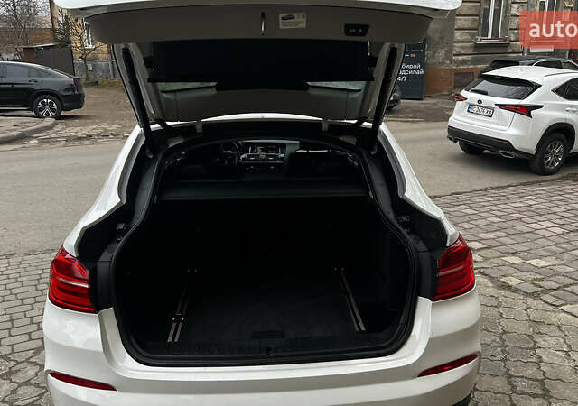 Белый БМВ Х4, объемом двигателя 2 л и пробегом 159 тыс. км за 19400 $, фото 11 на Automoto.ua