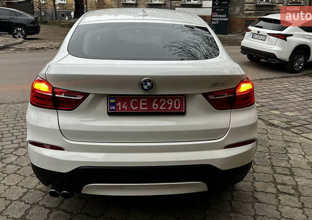 Белый БМВ Х4, объемом двигателя 2 л и пробегом 159 тыс. км за 19400 $, фото 4 на Automoto.ua