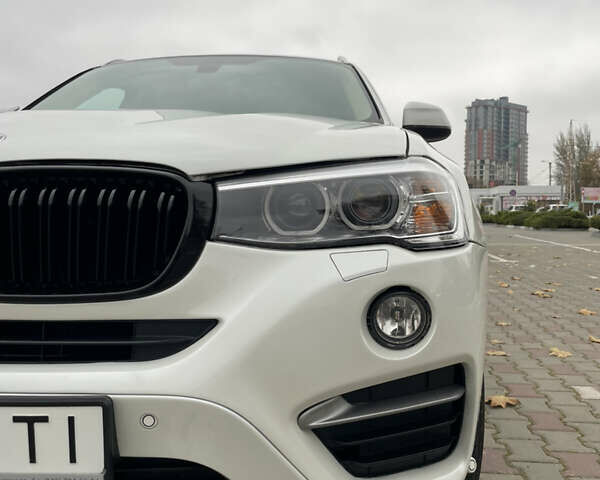 Белый БМВ Х4, объемом двигателя 2 л и пробегом 202 тыс. км за 25500 $, фото 30 на Automoto.ua
