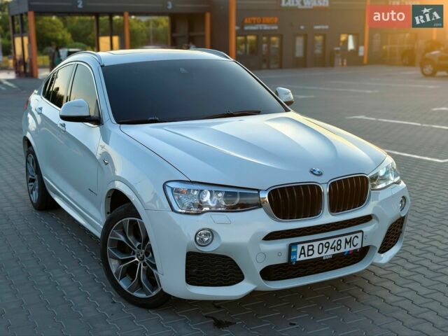 Белый БМВ Х4, объемом двигателя 2 л и пробегом 105 тыс. км за 25900 $, фото 2 на Automoto.ua