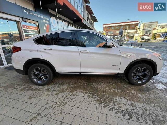 Белый БМВ Х4, объемом двигателя 2 л и пробегом 91 тыс. км за 27900 $, фото 4 на Automoto.ua
