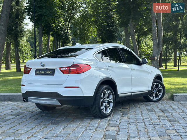 Белый БМВ Х4, объемом двигателя 2 л и пробегом 63 тыс. км за 27700 $, фото 24 на Automoto.ua