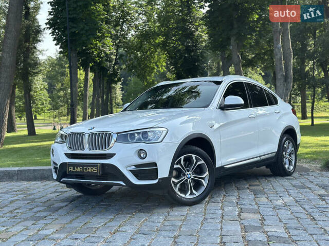 Белый БМВ Х4, объемом двигателя 2 л и пробегом 63 тыс. км за 27700 $, фото 1 на Automoto.ua