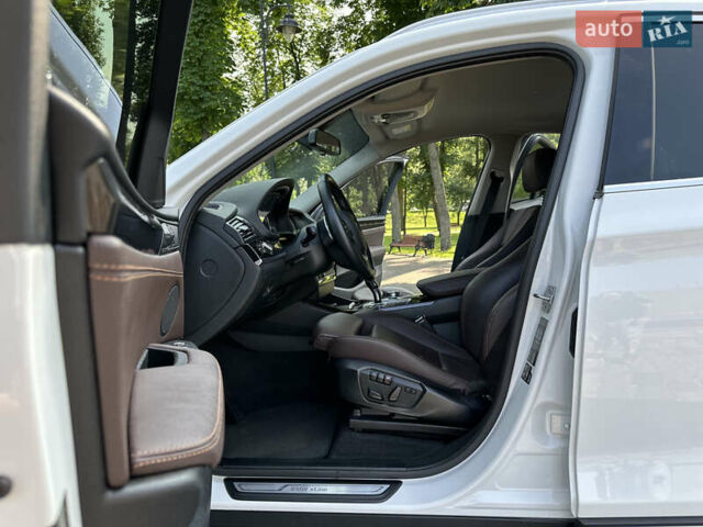 Белый БМВ Х4, объемом двигателя 2 л и пробегом 63 тыс. км за 27700 $, фото 37 на Automoto.ua