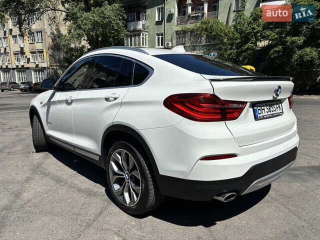Белый БМВ Х4, объемом двигателя 2 л и пробегом 114 тыс. км за 27600 $, фото 4 на Automoto.ua