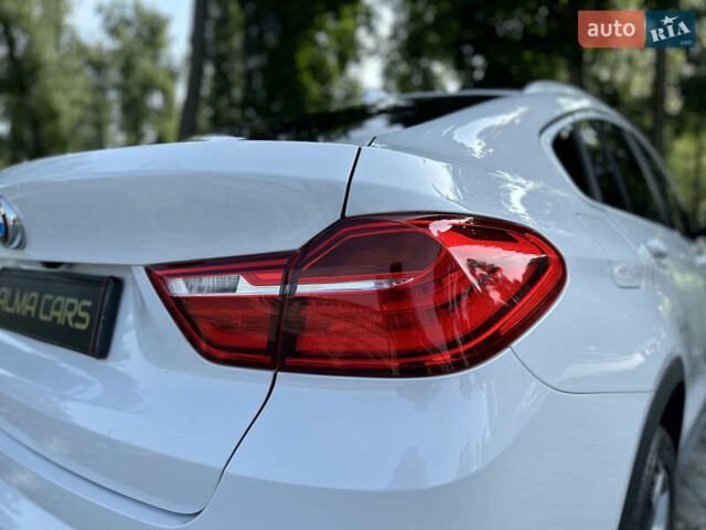 Белый БМВ Х4, объемом двигателя 2 л и пробегом 63 тыс. км за 27700 $, фото 27 на Automoto.ua