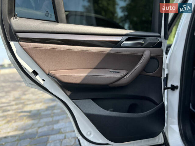 Белый БМВ Х4, объемом двигателя 2 л и пробегом 63 тыс. км за 27700 $, фото 50 на Automoto.ua