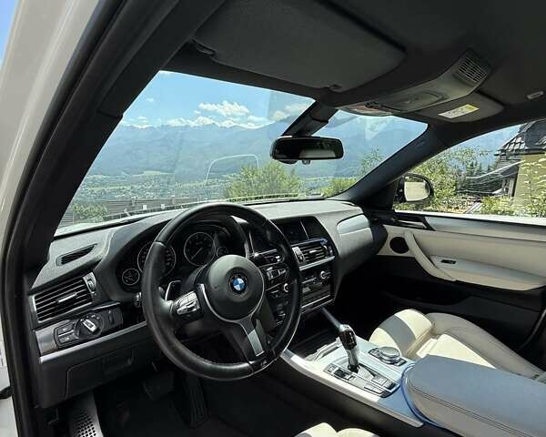 Белый БМВ Х4, объемом двигателя 2 л и пробегом 163 тыс. км за 23500 $, фото 19 на Automoto.ua